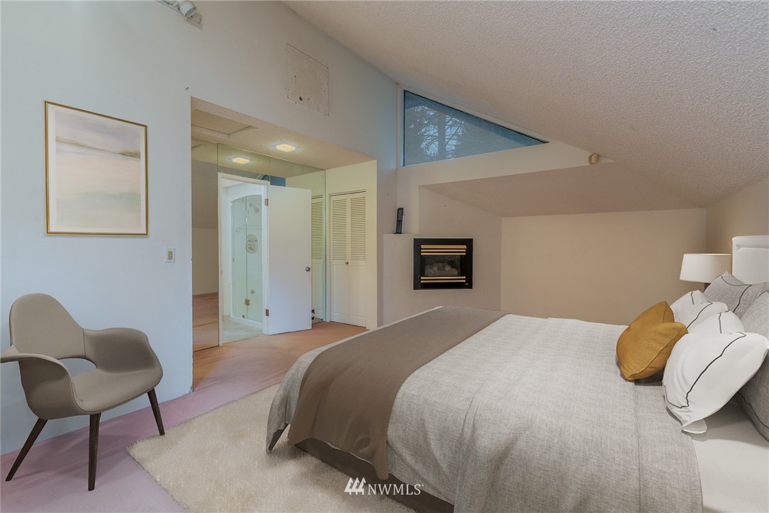 2254 Cedar Point Avenue Point Roberts, WA 98281 - Photo 17 of 39 a spacious bedroom with a bed and a chair