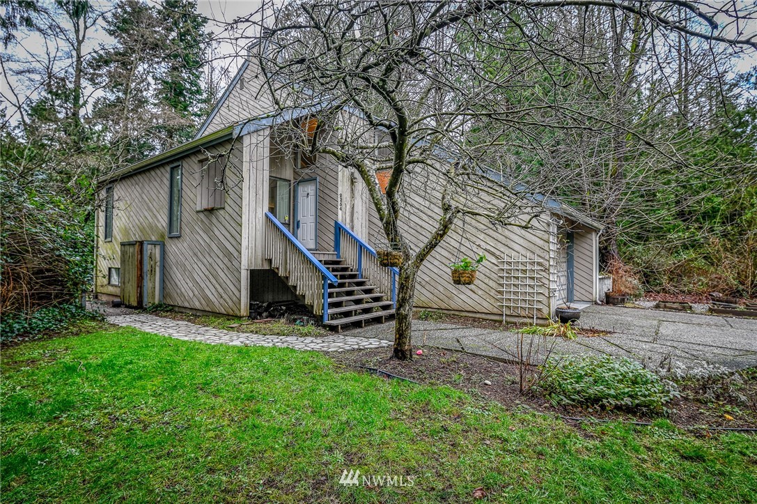 2254 Cedar Point Avenue Point Roberts, WA 98281 - Photo 3 of 39 a view of backyard with wooden fence and a stairs