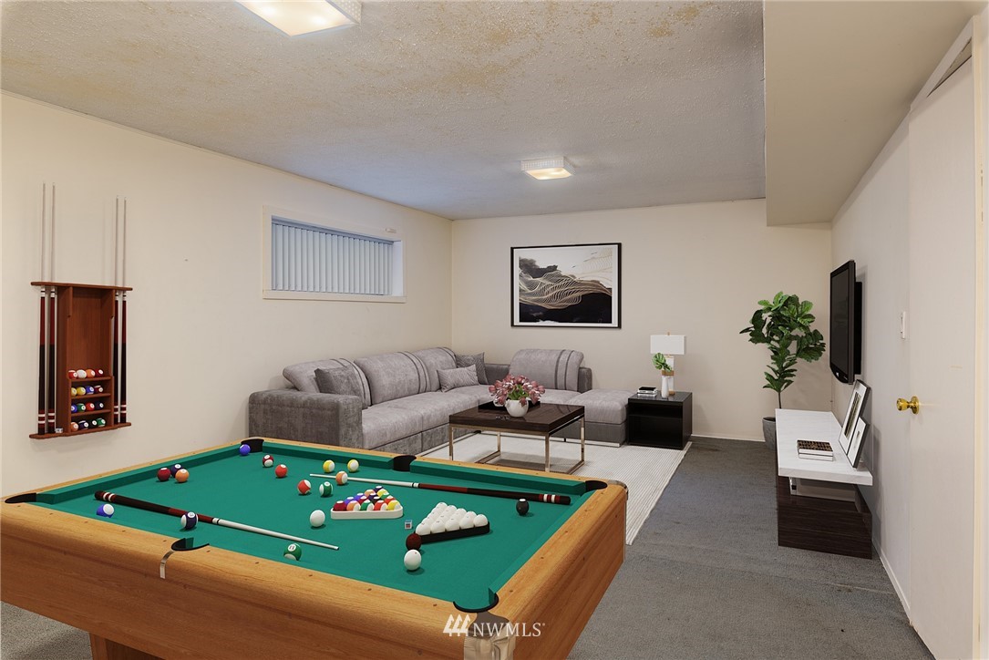 2254 Cedar Point Avenue Point Roberts, WA 98281 - Photo 25 of 39 a living room with furniture and a table