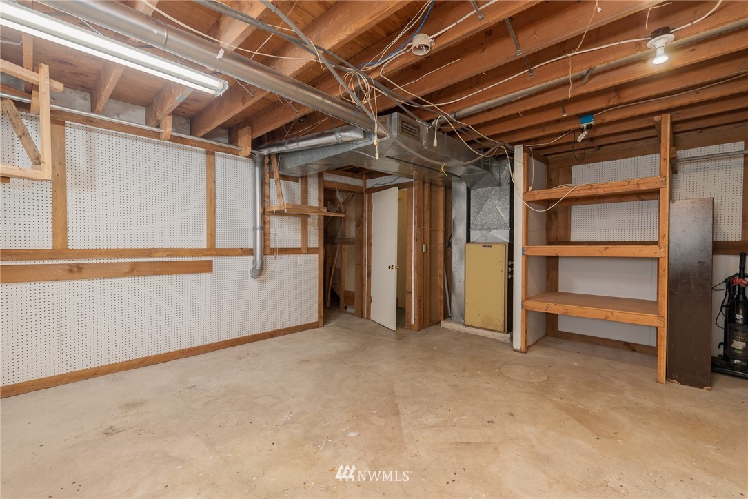 2254 Cedar Point Avenue Point Roberts, WA 98281 - Photo 28 of 39 a view of an empty room with a garage