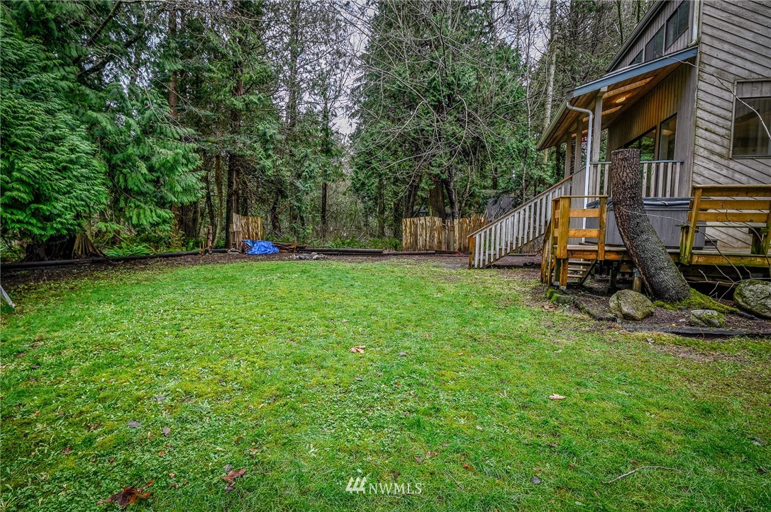 2254 Cedar Point Avenue Point Roberts, WA 98281 - Photo 29 of 39 a view of a back yard of the house