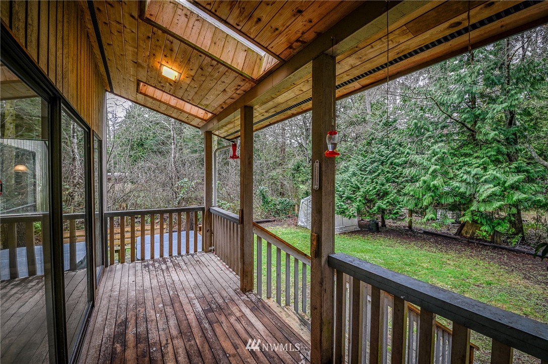 2254 Cedar Point Avenue Point Roberts, WA 98281 - Photo 31 of 39 a view of a porch with wooden floor and outdoor space