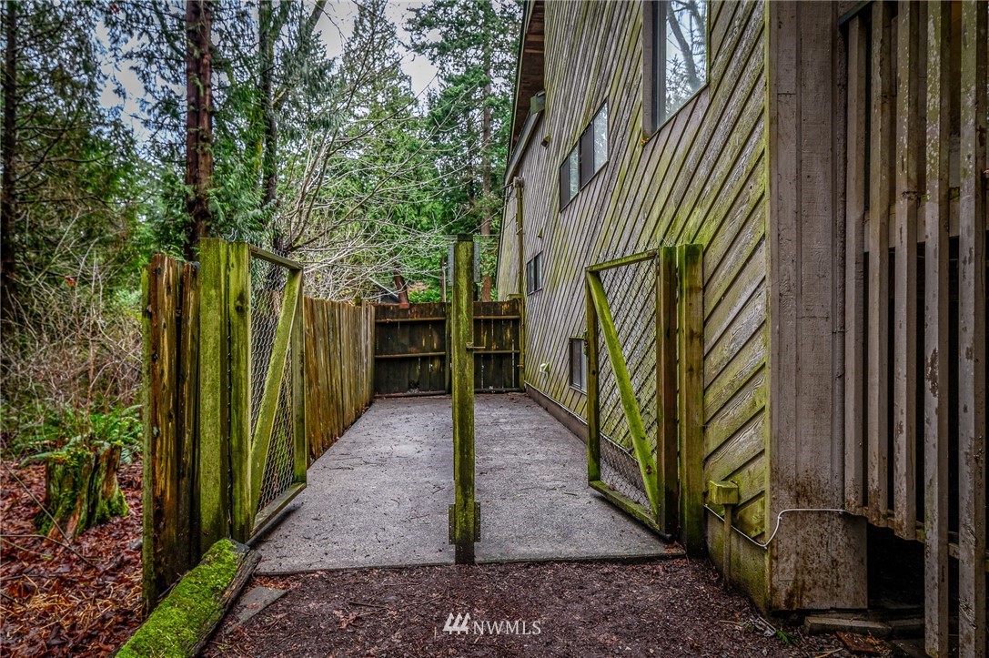 2254 Cedar Point Avenue Point Roberts, WA 98281 - Photo 33 of 39 a view of a pathway of a building in front of a yard