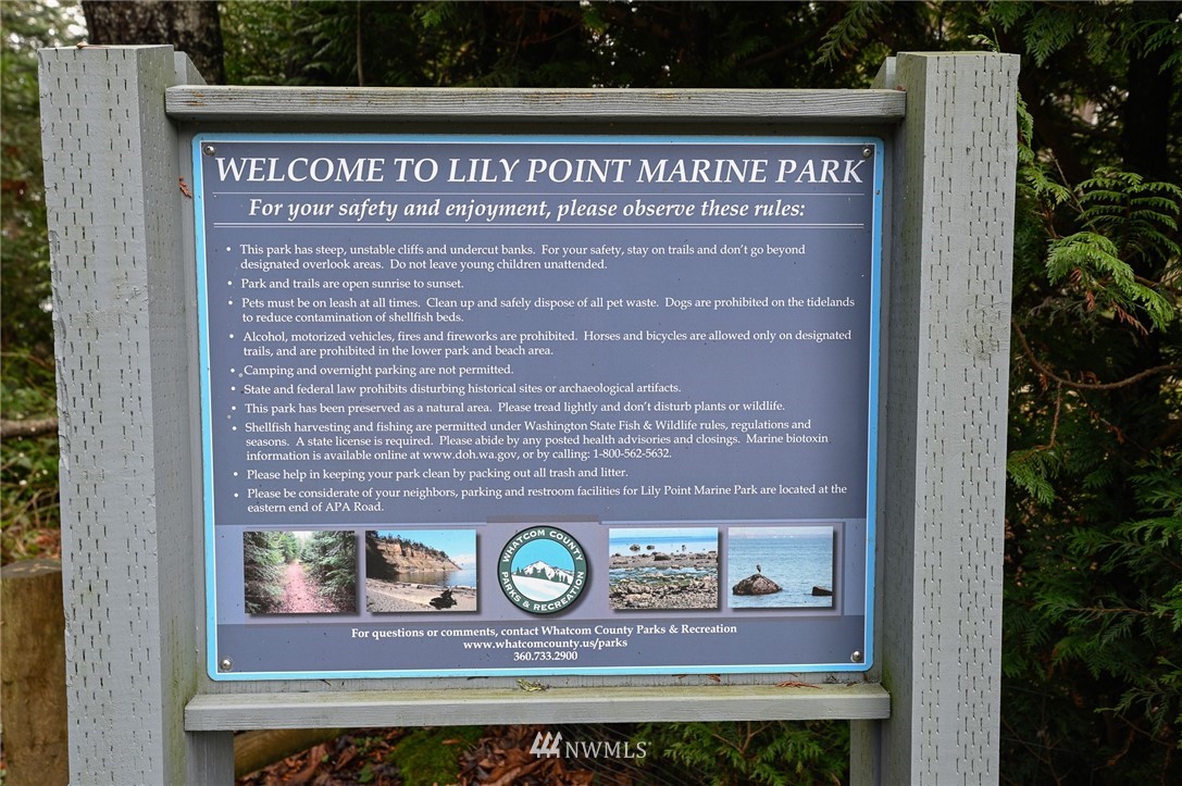 2254 Cedar Point Avenue Point Roberts, WA 98281 - Photo 38 of 39 a sign on the side of a building