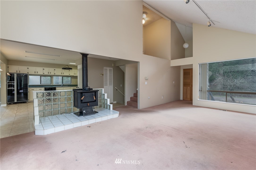 2254 Cedar Point Avenue Point Roberts, WA 98281 - Photo 10 of 39 a view of a livingroom with furniture and a fireplace