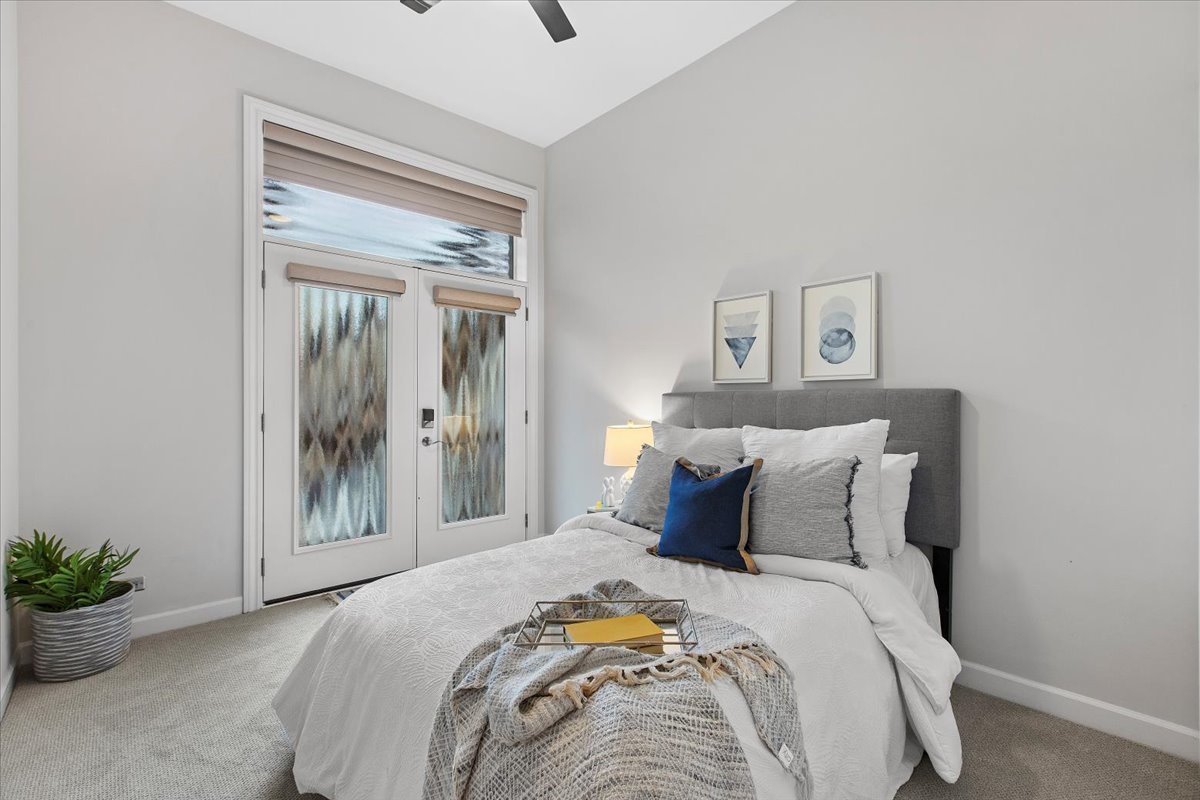 1867 North Halsted Street, Unit 1N Chicago, IL 60614 - Photo 19 of 30 a bedroom with a bed and a potted plant