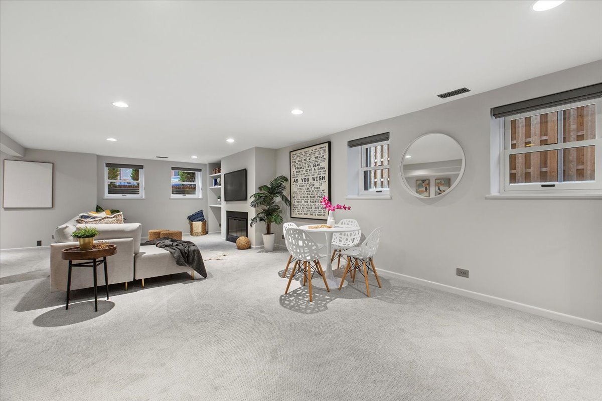 1867 North Halsted Street, Unit 1N Chicago, IL 60614 - Photo 22 of 30 a view of a livingroom with furniture and white walls