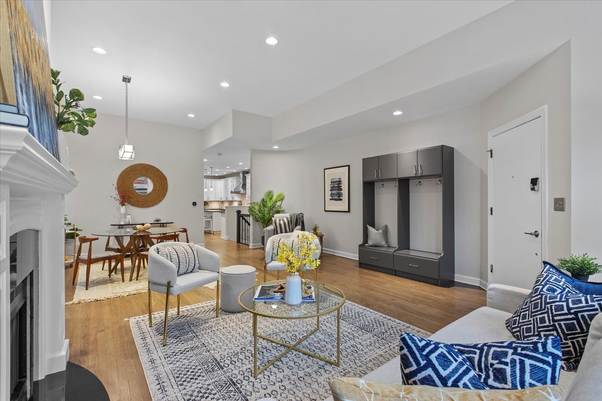 1867 North Halsted Street, Unit 1N Chicago, IL 60614 - Photo 5 of 30 a living room with furniture and wooden floor