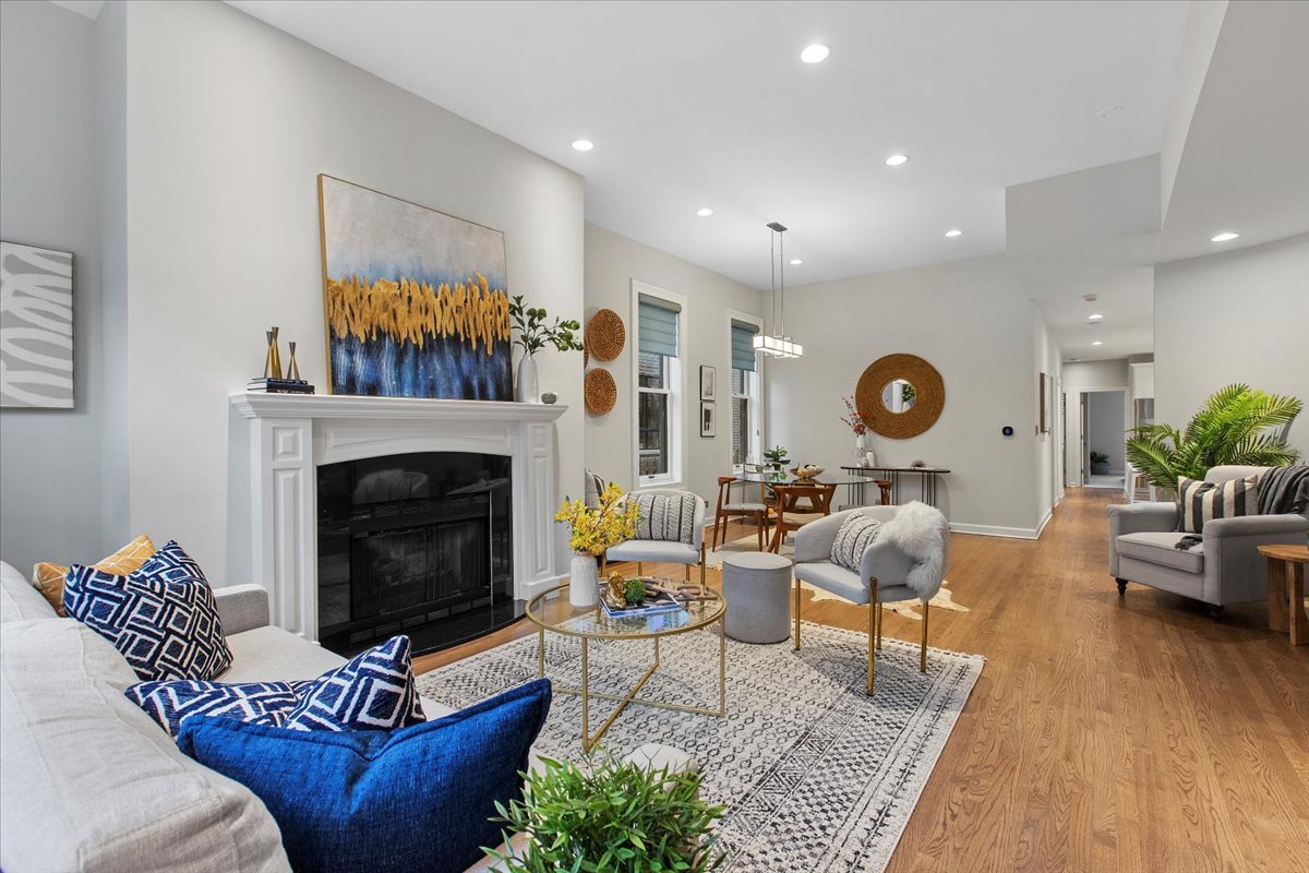 1867 North Halsted Street, Unit 1N Chicago, IL 60614 - Photo 6 of 30 a living room with furniture and a fireplace