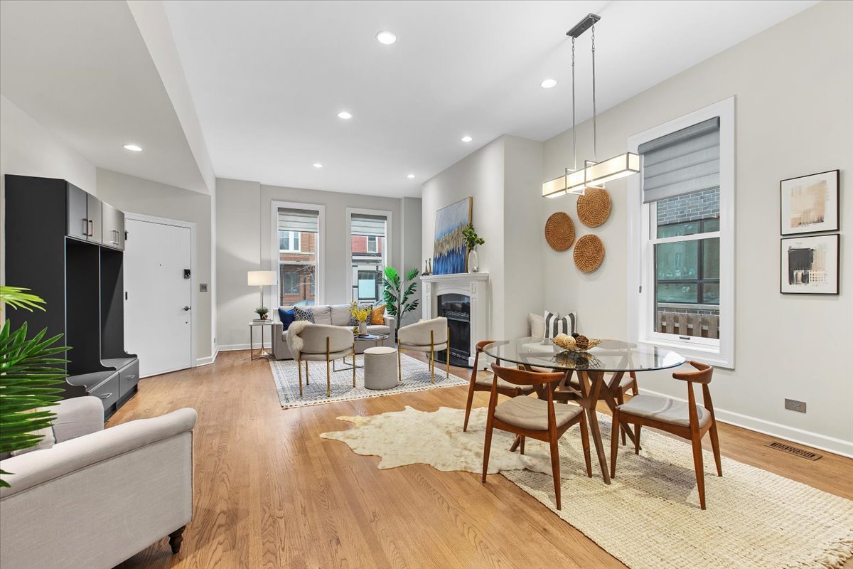 1867 North Halsted Street, Unit 1N Chicago, IL 60614 - Photo 7 of 30 a living room with furniture and a flat screen tv