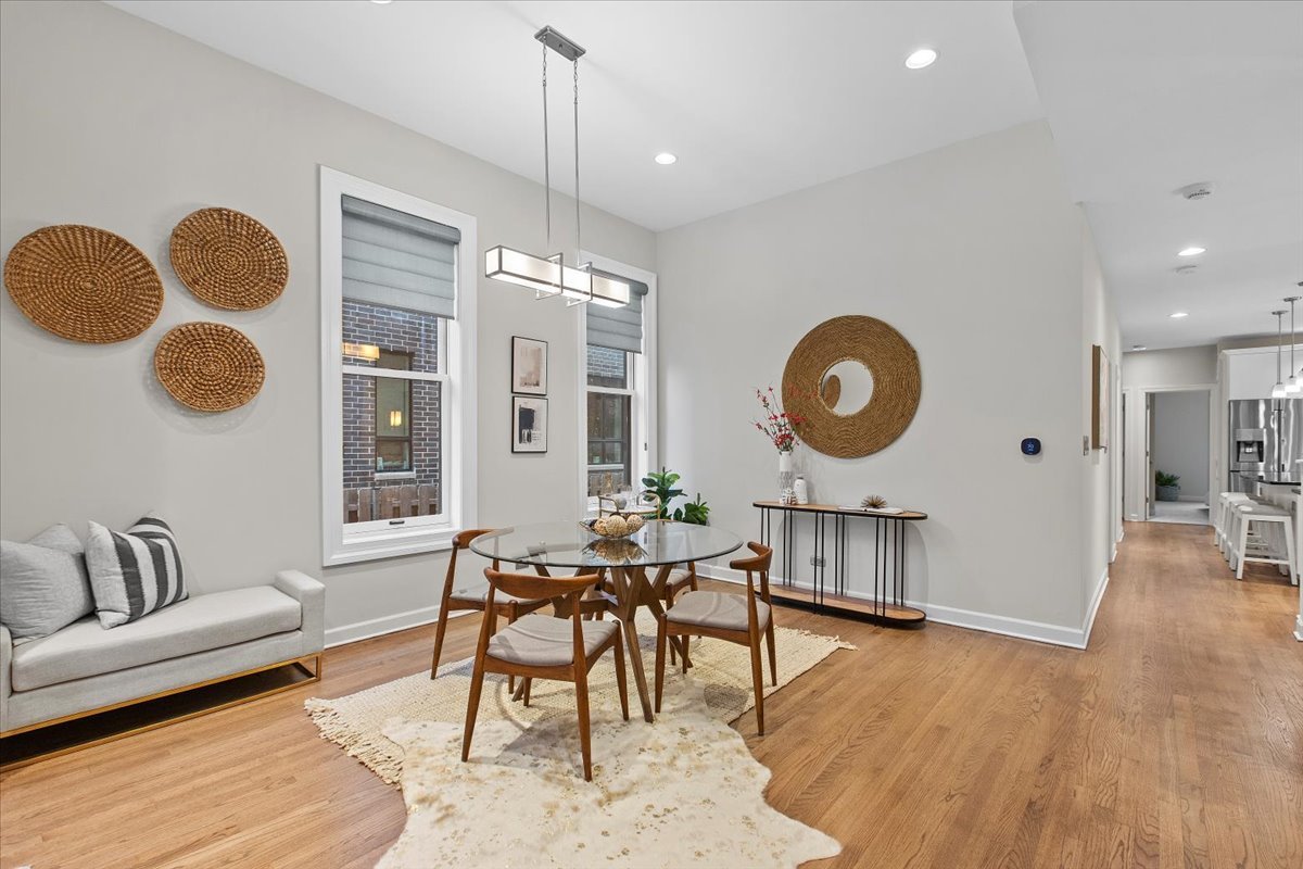 1867 North Halsted Street, Unit 1N Chicago, IL 60614 - Photo 9 of 30 a living room with furniture and a large window