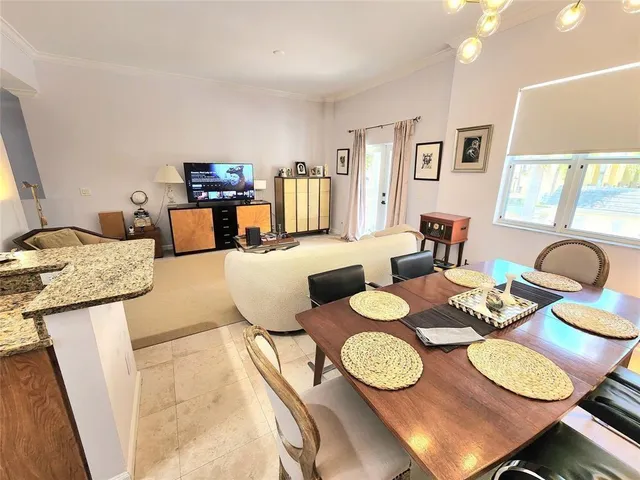 a dining room with furniture and a dining table