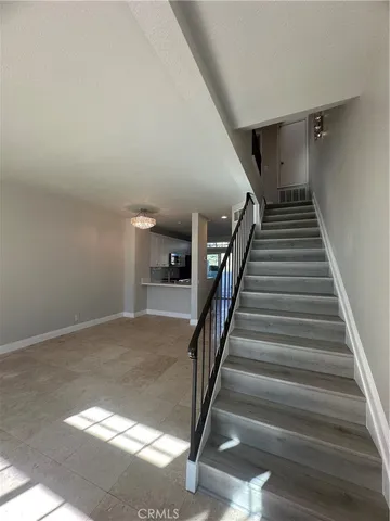 a view of a utility room with racks on the wall