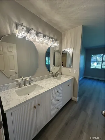 a bathroom with a tub toilet and sink