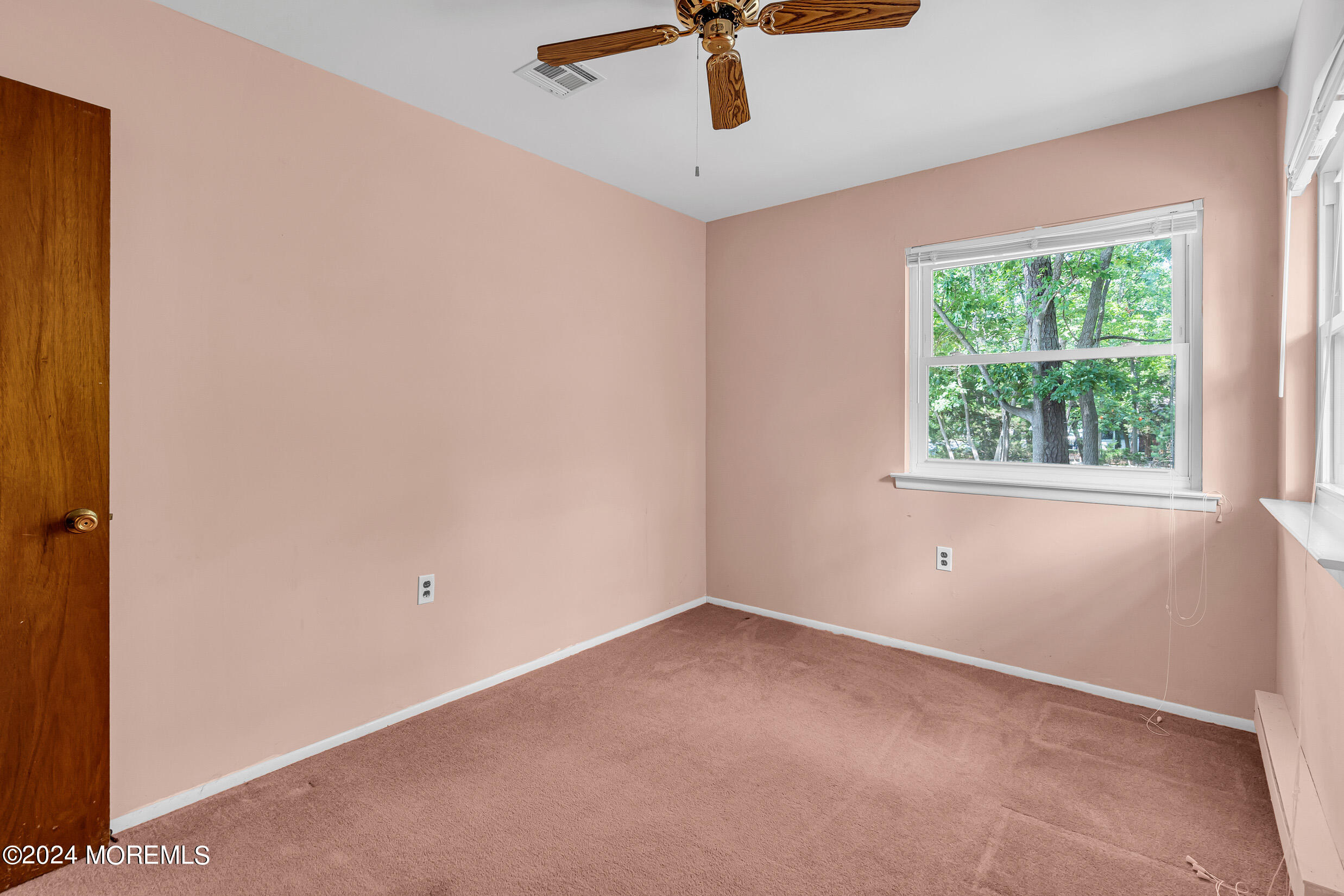 141 B Azalea Drive Whiting, NJ 08759 - Photo 11 of 17 an empty room with a window