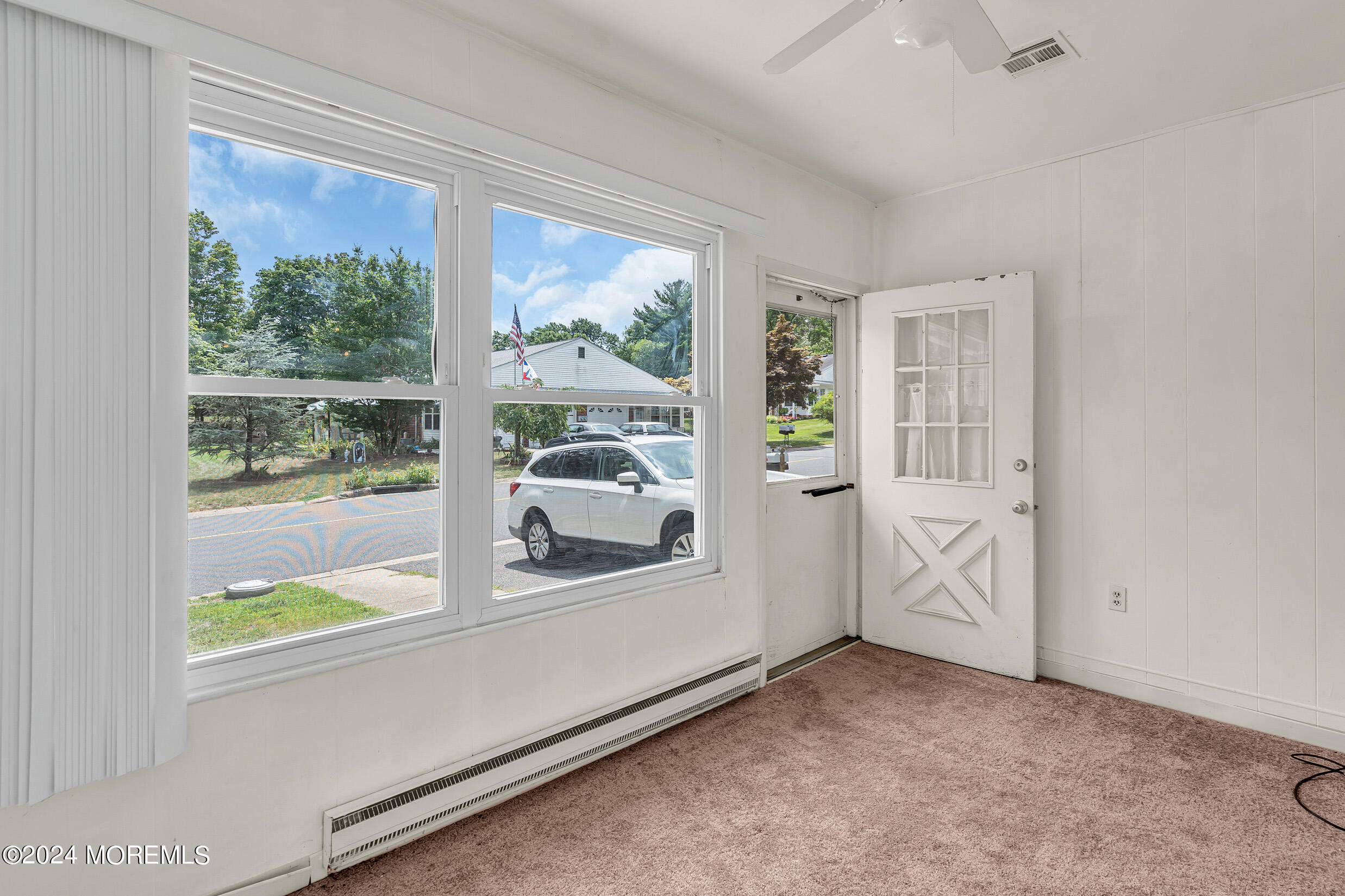 141 B Azalea Drive Whiting, NJ 08759 - Photo 7 of 17 a view of a room that has a large window