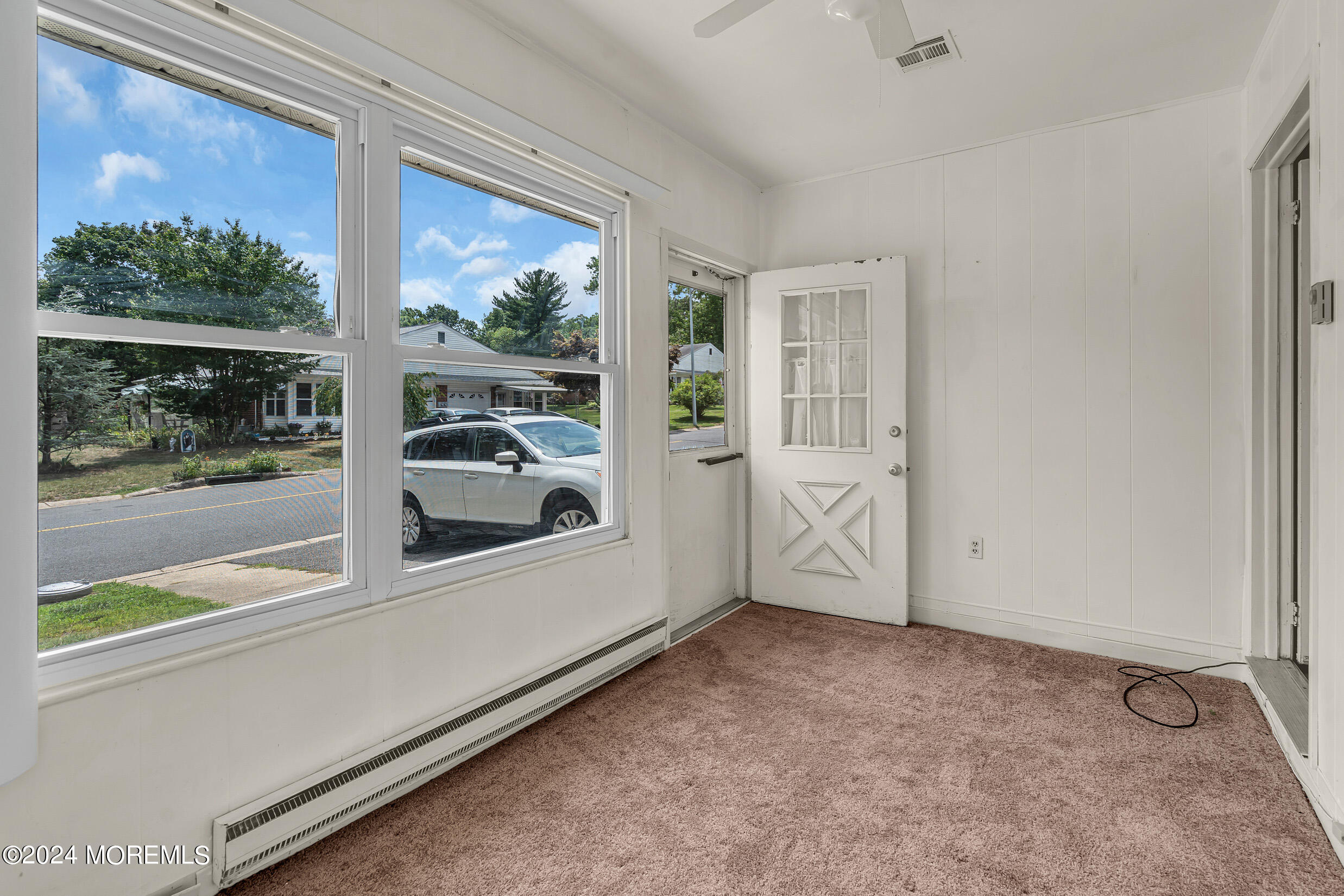141 B Azalea Drive Whiting, NJ 08759 - Photo 8 of 17 a view of a hallway with a window