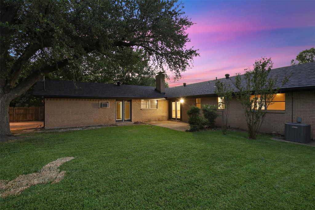 3126 Jubilee Trail Dallas, TX 75229 - Photo 28 of 38 a view of a house with a yard