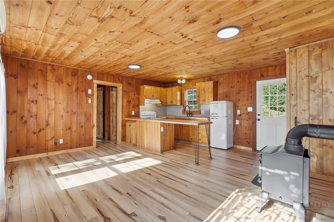 286 Grady Winkler Road Boone, NC 28607 - Photo 7 of 13 a view of kitchen with furniture and wooden floor