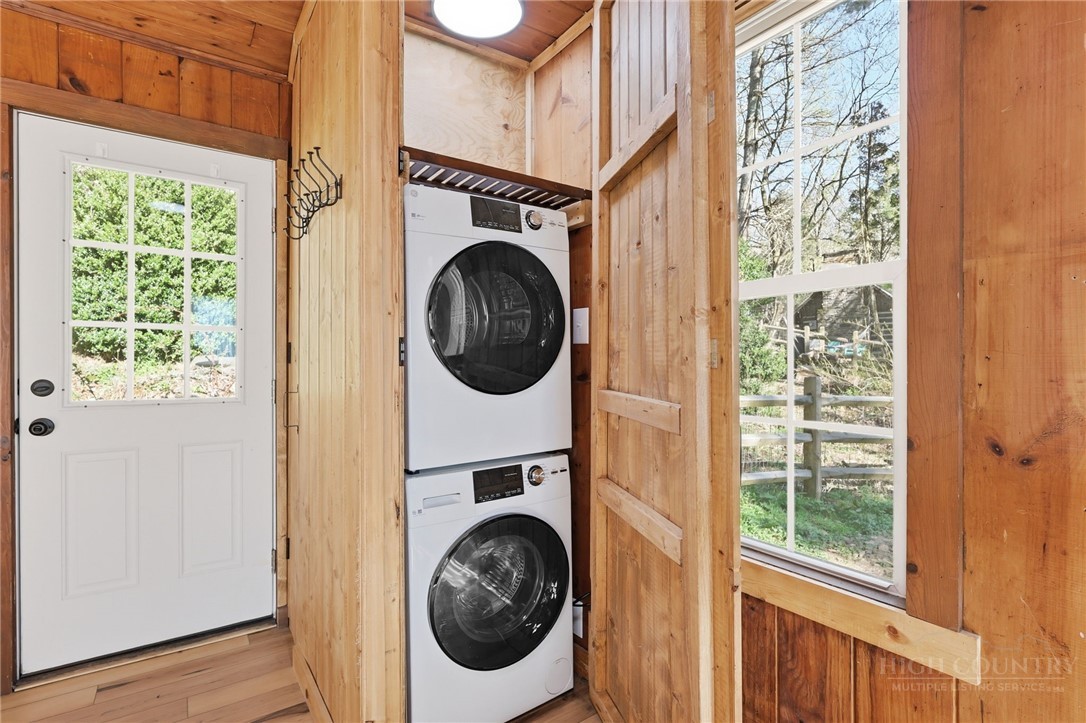 286 Grady Winkler Road Boone, NC 28607 - Photo 8 of 13 a view of a hallway with washer and dryer