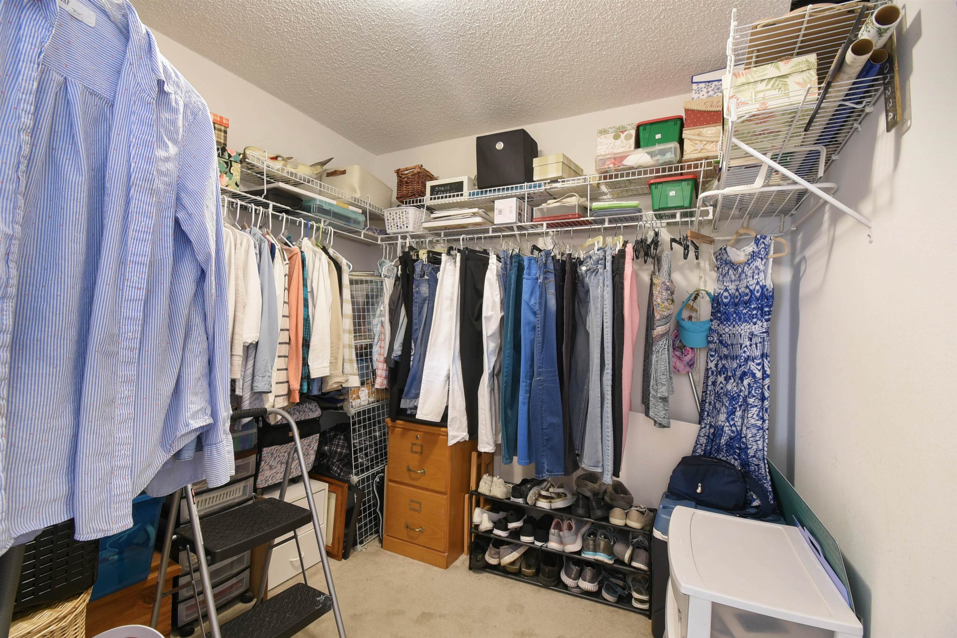 1711 Old Beach Road St. Augustine, FL 32080 - Photo 15 of 34 a view of walk in closet with clothes and shoes
