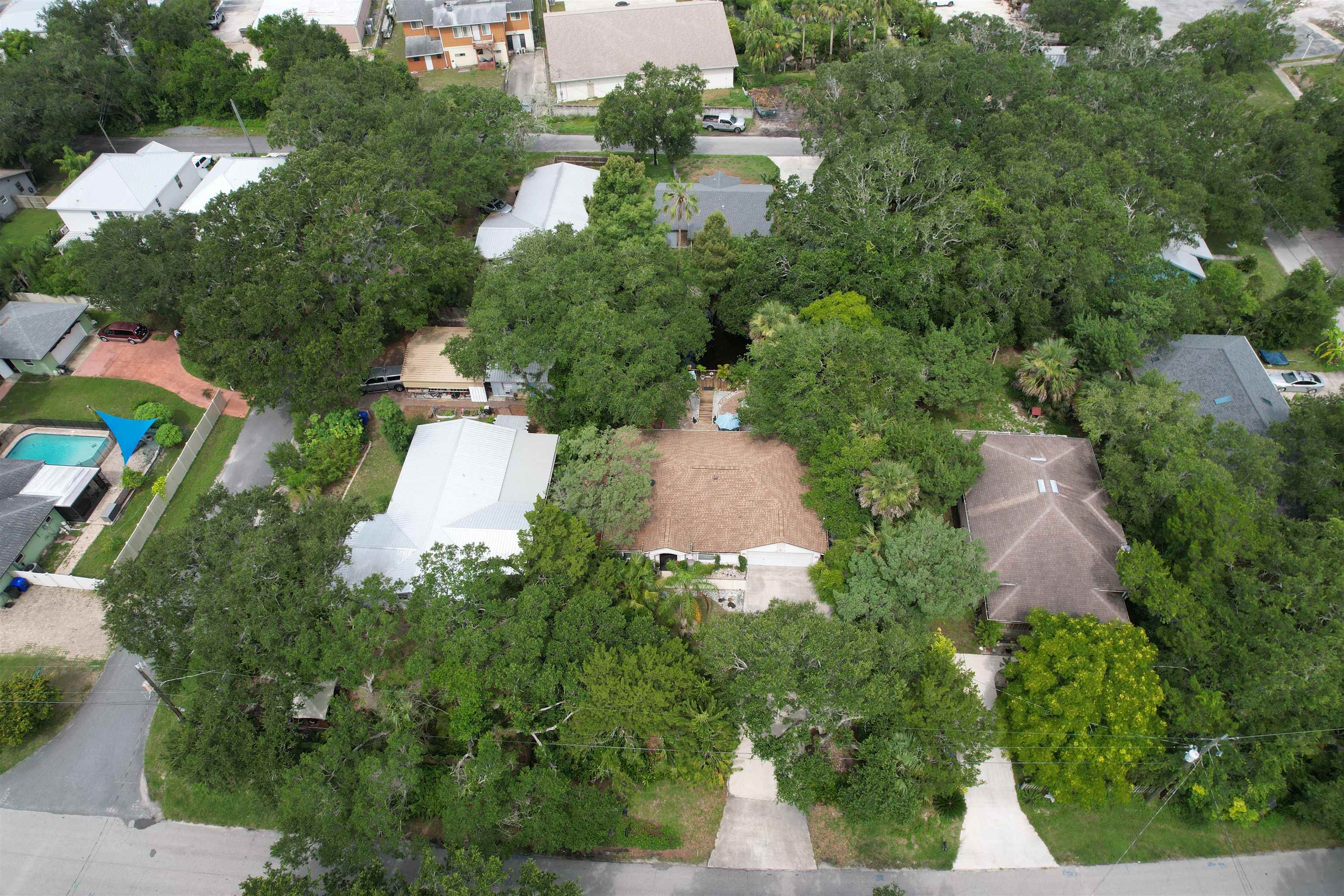 1711 Old Beach Road St. Augustine, FL 32080 - Photo 32 of 34 an aerial view of a house with yard