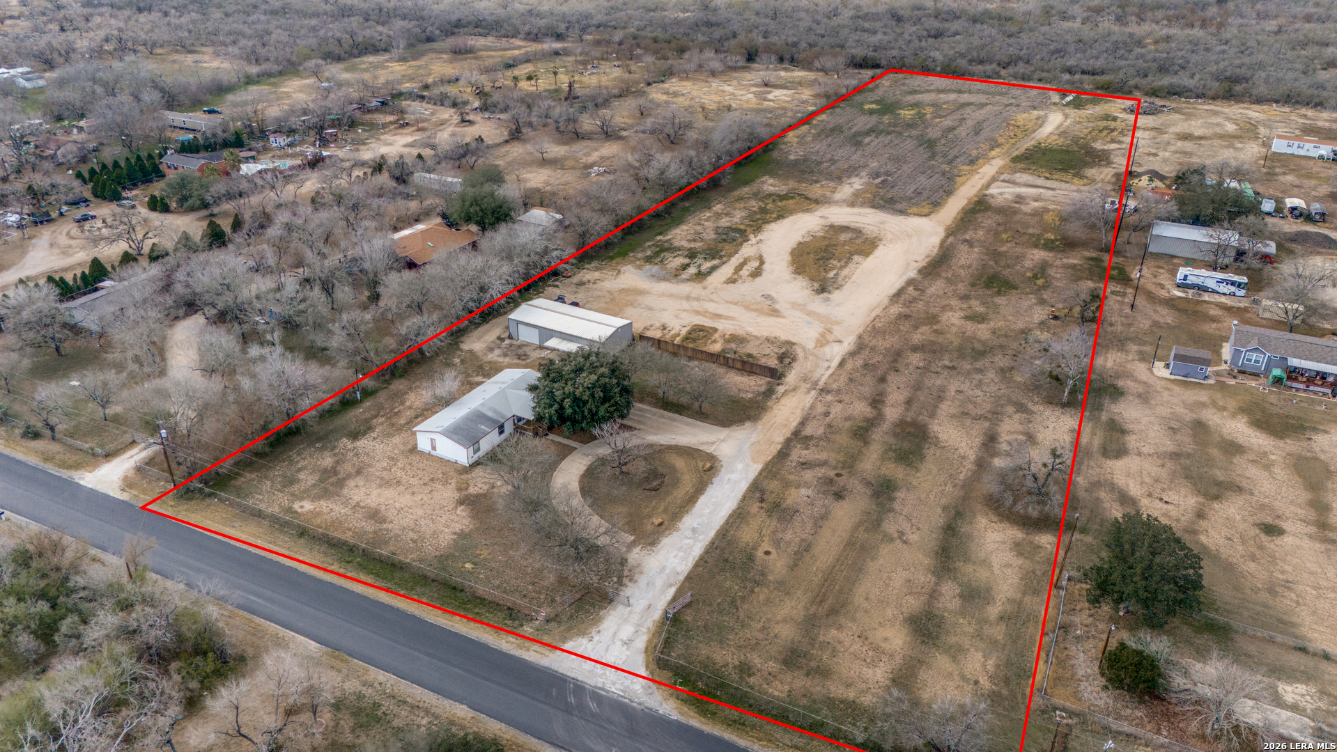 14975 Flatten Road San Antonio, TX 78223 - Photo 1 of 28 a view of wooden floor