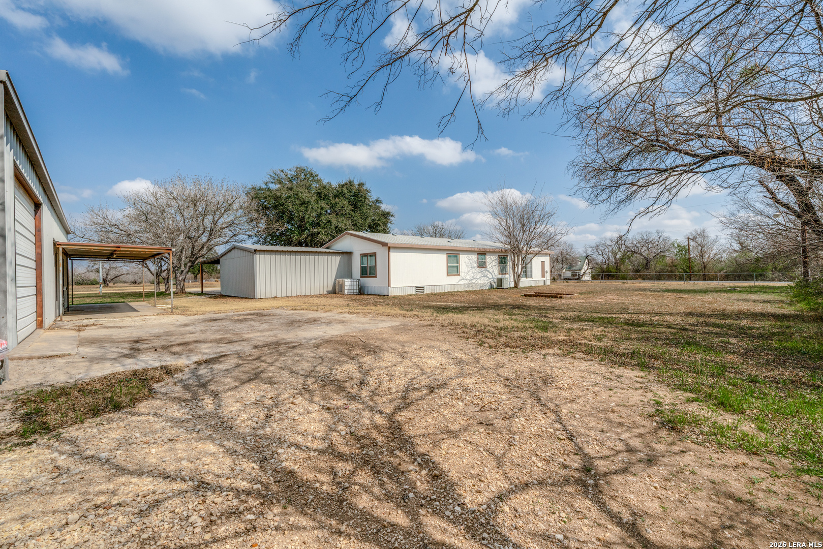 14975 Flatten Road San Antonio, TX 78223 - Photo 26 of 28 a house view with a outdoor space