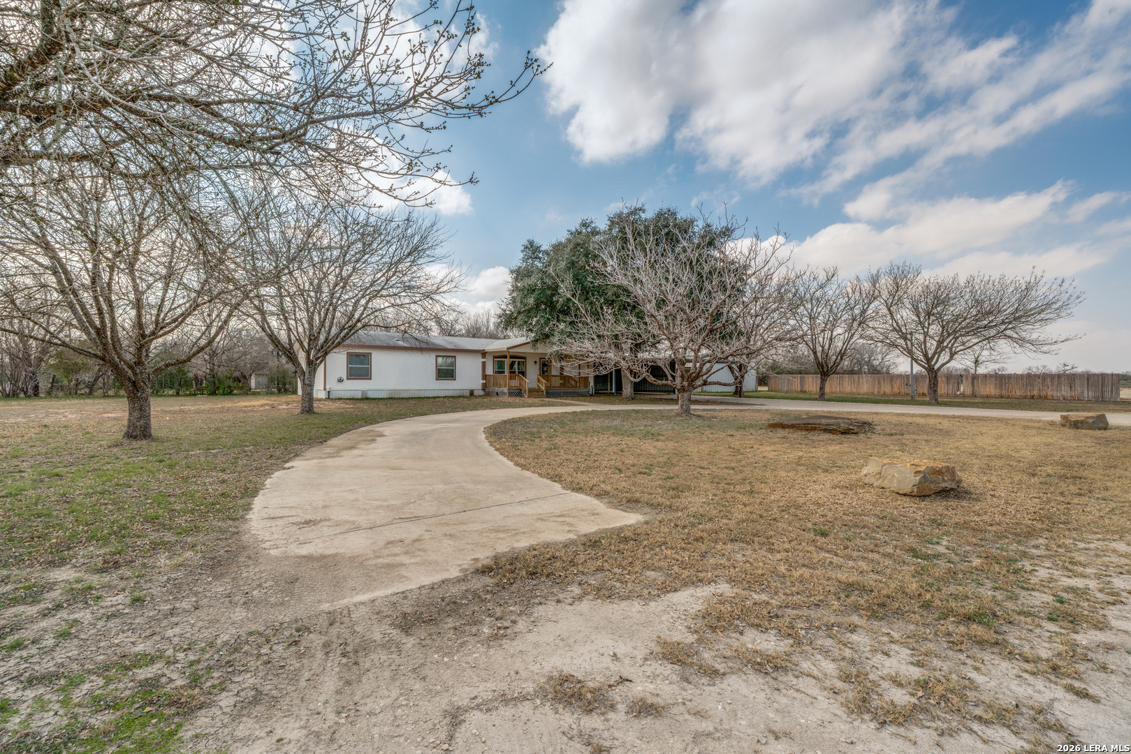 14975 Flatten Road San Antonio, TX 78223 - Photo 3 of 28 a view of outdoor space with trees