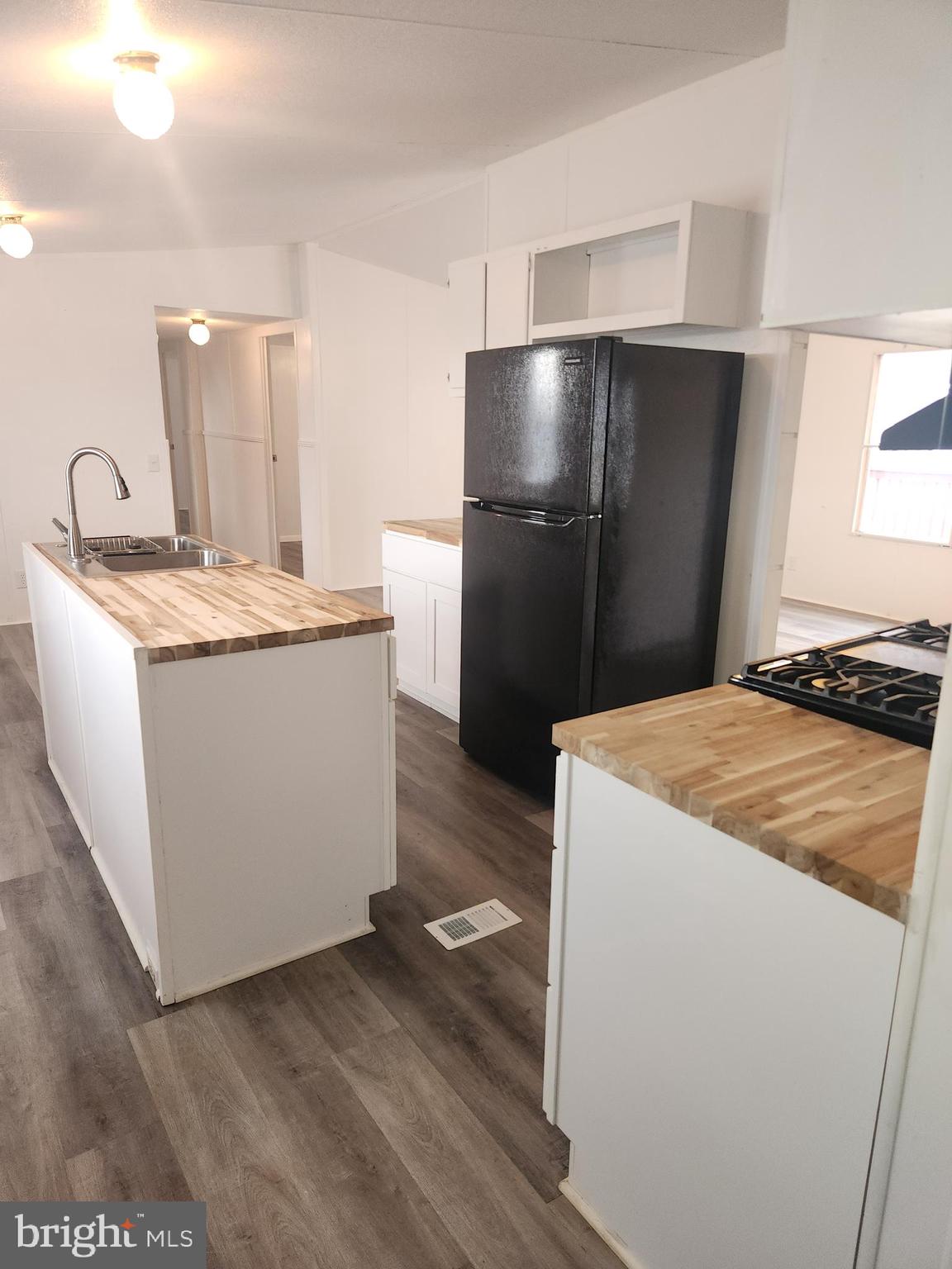 701 Cassel Road Manchester, PA 17345 - Photo 5 of 12 a kitchen with stainless steel appliances granite countertop a refrigerator a stove and a sink