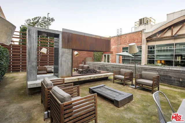 a building outdoor space with patio furniture