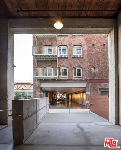 a view of a balcony with furniture