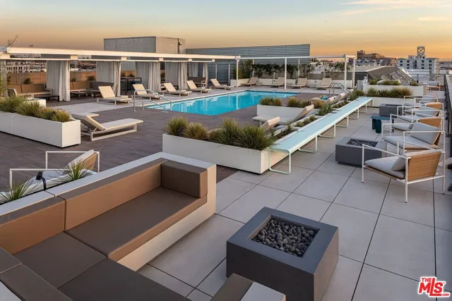 a view of a balcony with chairs
