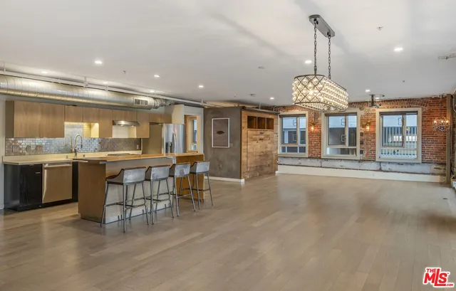 a view of a kitchen and a sink