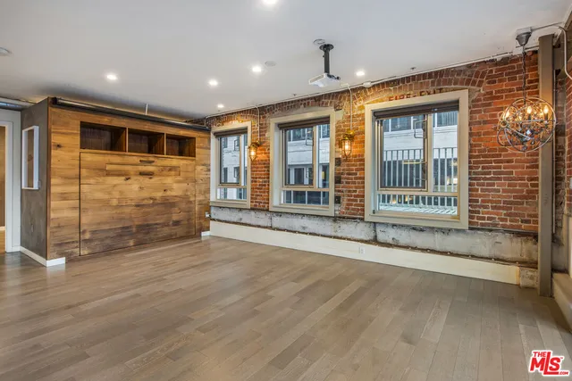 a view of an entryway with wooden door