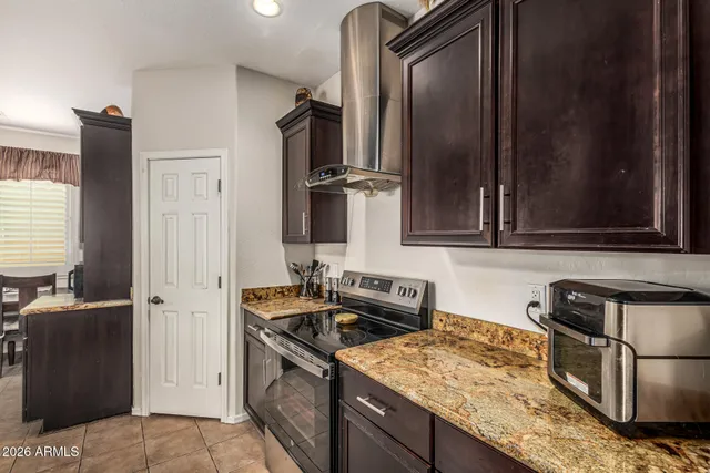 a bathroom with a double vanity sink and a shower