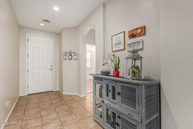 a bathroom with a toilet a sink and a mirror