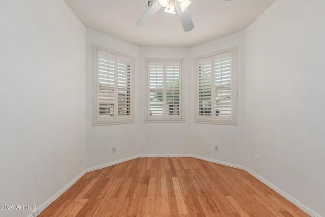 a living room with furniture and a stair