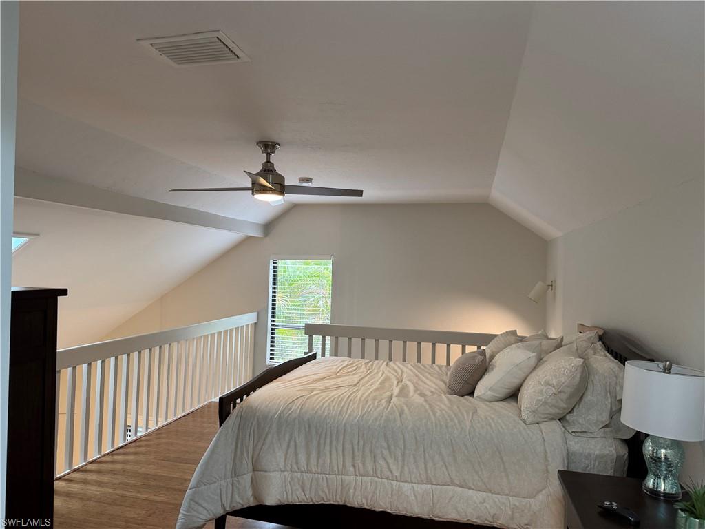 1281 Solana Road Naples, FL 34103 - Photo 24 of 31 Loft Bedroom with Skylight