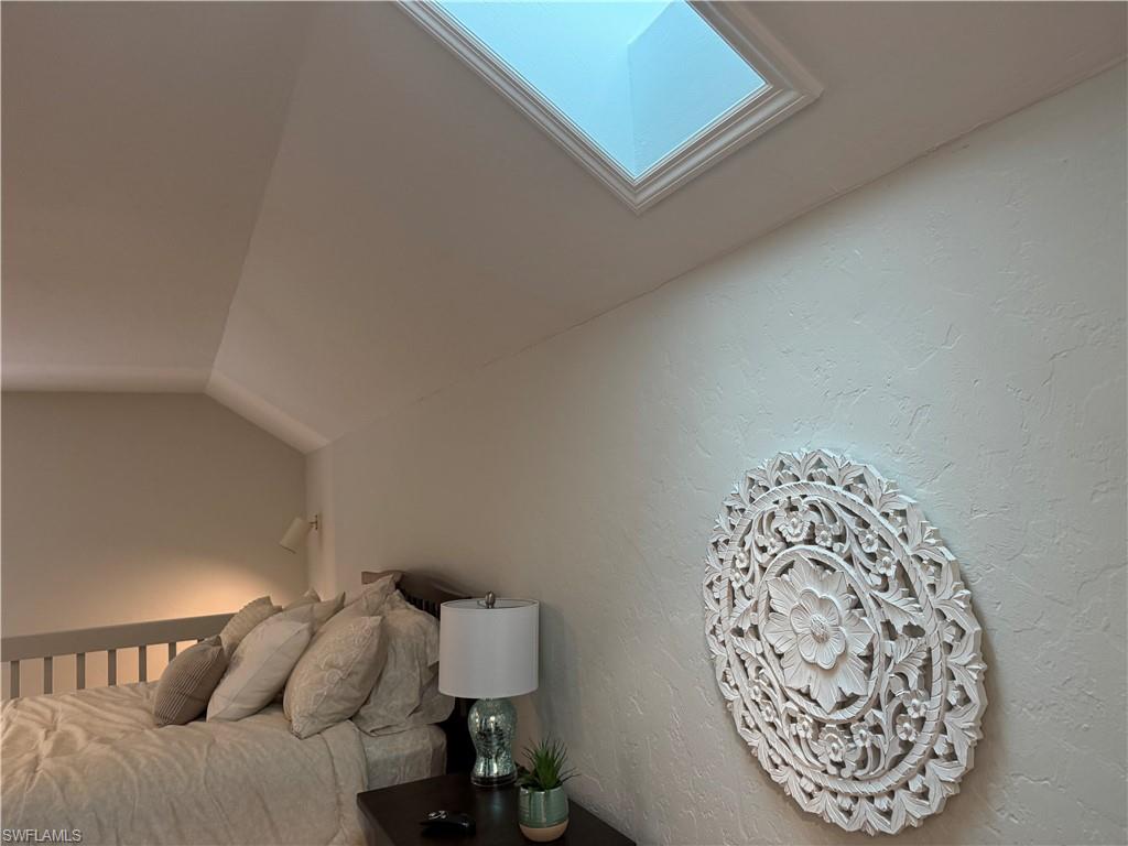 1281 Solana Road Naples, FL 34103 - Photo 25 of 31 Loft Bedroom with Bamboo Floors