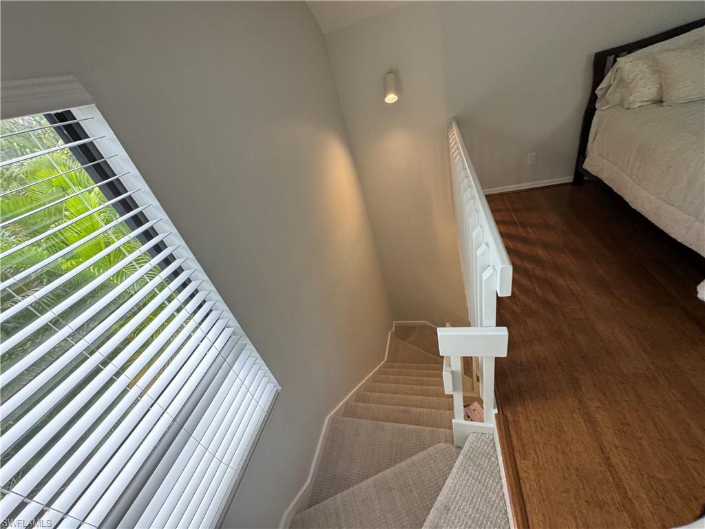 1281 Solana Road Naples, FL 34103 - Photo 28 of 31 Loft View down to Great Room
