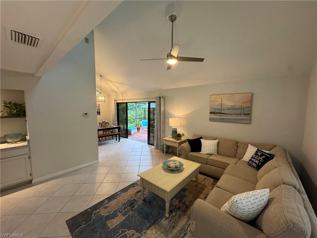 1281 Solana Road Naples, FL 34103 - Photo 3 of 31 Great Room with Wet Bar and Lanai Entry