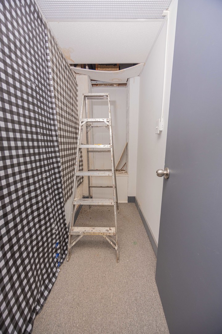 104 South Franklin Street Dwight, IL 60420 - Photo 14 of 20 a room with a wooden floor and white walls