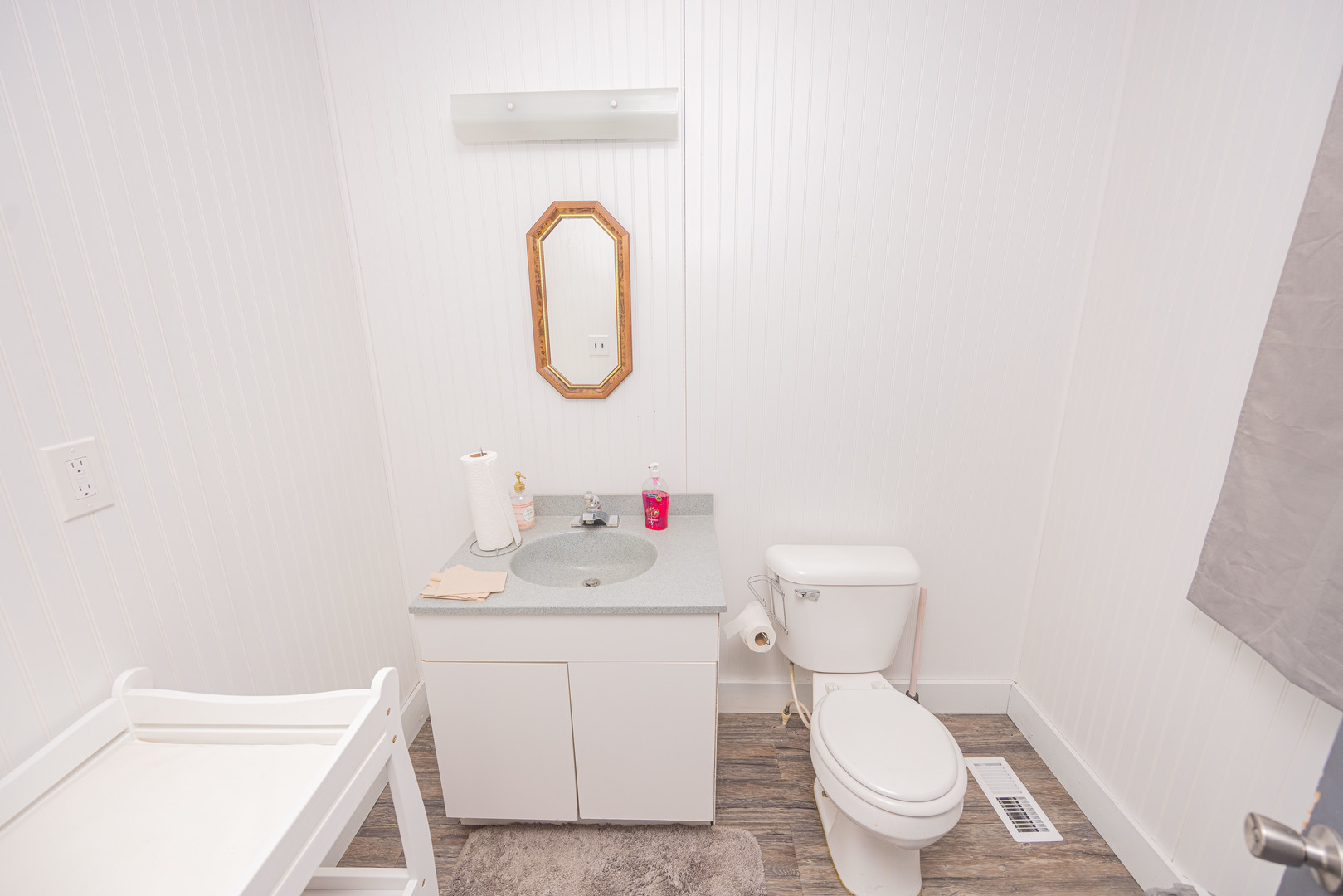104 South Franklin Street Dwight, IL 60420 - Photo 17 of 20 a bathroom with a sink toilet and a mirror