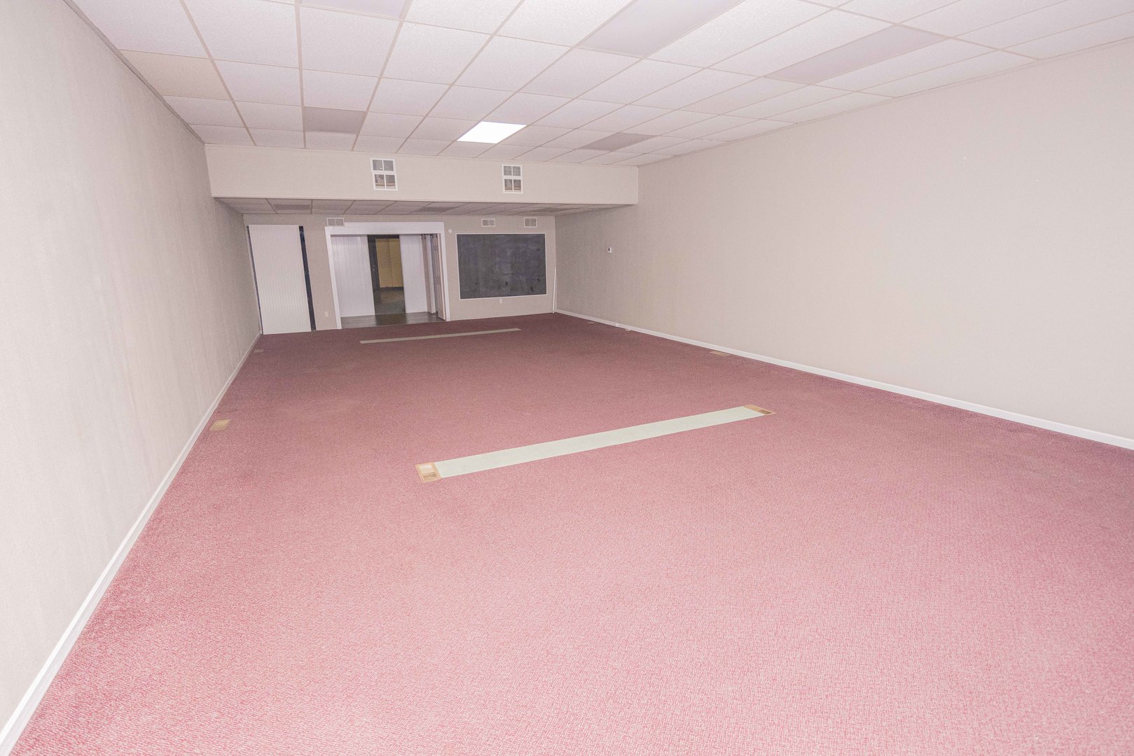 104 South Franklin Street Dwight, IL 60420 - Photo 19 of 20 an empty room with windows