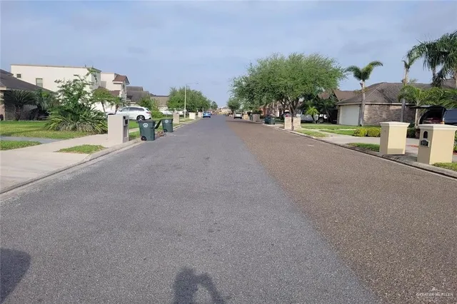 a view of a street with houses