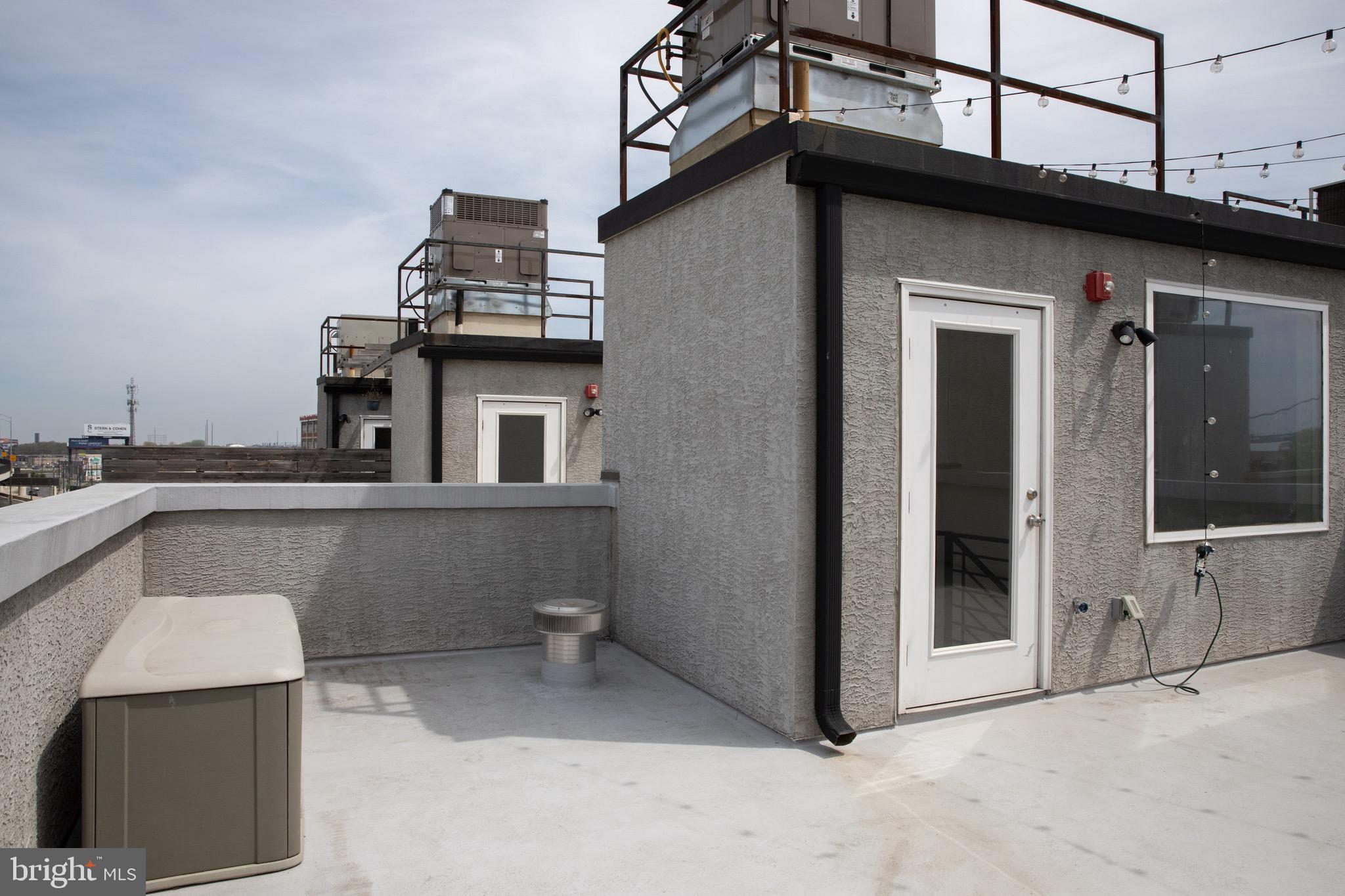 323 East Allen Street, Unit 4 Philadelphia, PA 19125 - Photo 19 of 24 a view of a building and car parked