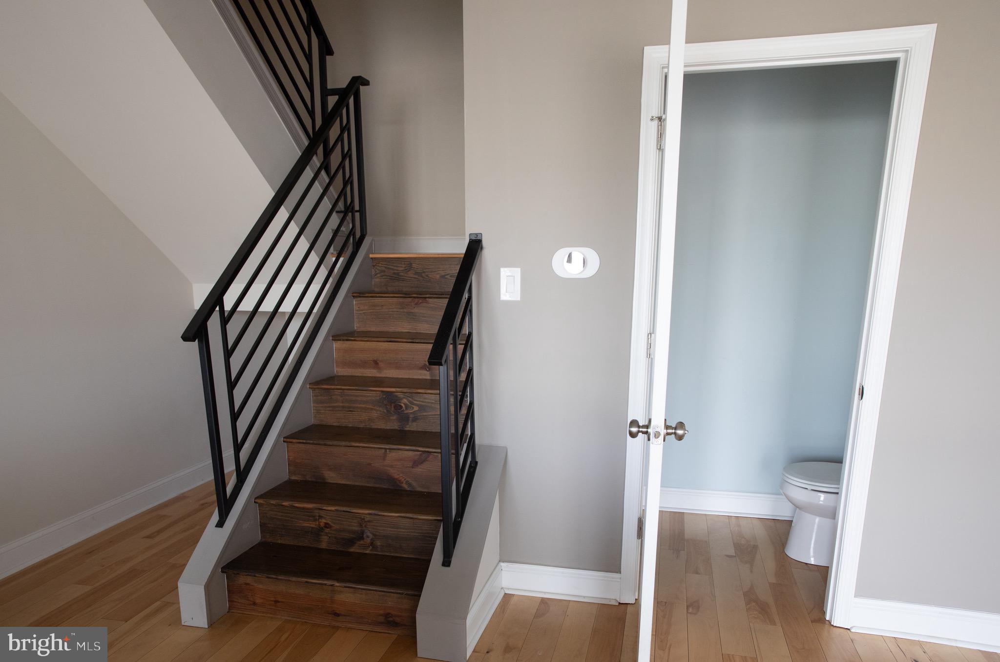 323 East Allen Street, Unit 4 Philadelphia, PA 19125 - Photo 6 of 24 a view of a hallway with wooden floor and entryway