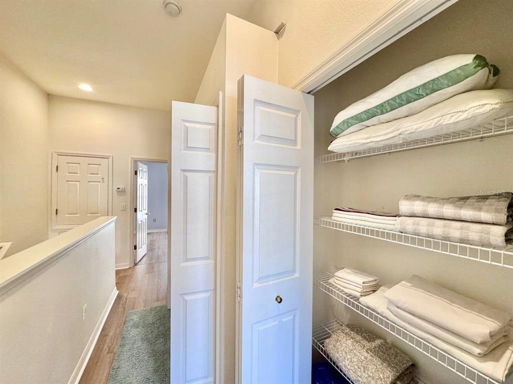 10035 Tranquility Way Tampa, FL 33625 - Photo 14 of 28 a bathroom with a sink a toilet and shower