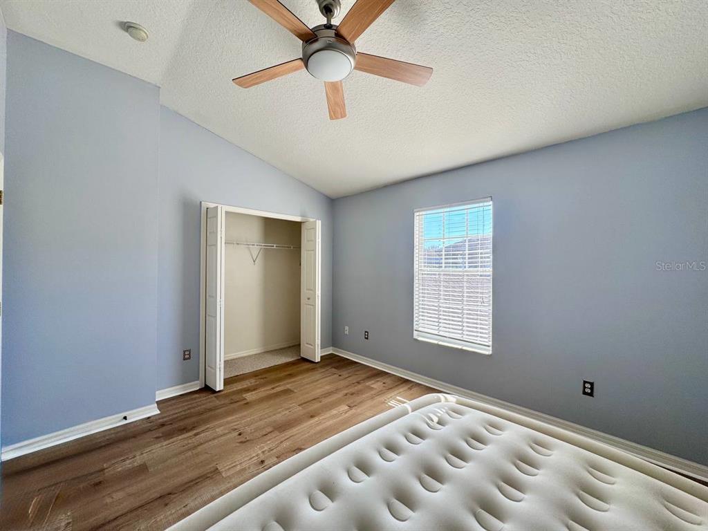 10035 Tranquility Way Tampa, FL 33625 - Photo 17 of 28 a view of an empty room with a window